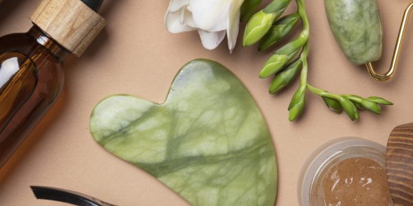 flat-lay-gua-sha-care-products-arrangement